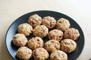 Homemade Vanilla Chocolate cookies on wooden plate