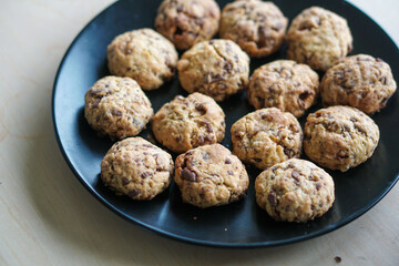 Homemade Vanilla Chocolate cookies on wooden plate