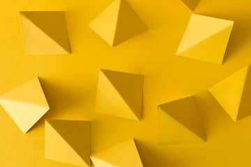 Abstract yellow background with triangle shapes