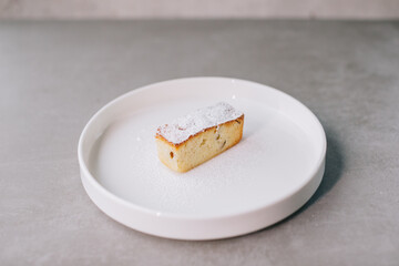 Delicious French almond flour cake on a plate. Close-up..