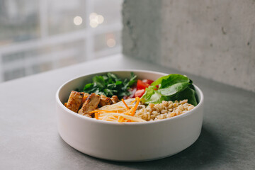 Food on an elegant white plate, lunch or dinner dish. Delicious food in a restaurant close-up.