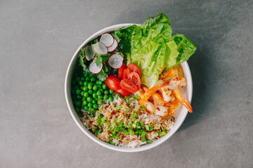 Poke bowl with rice and shrimp..