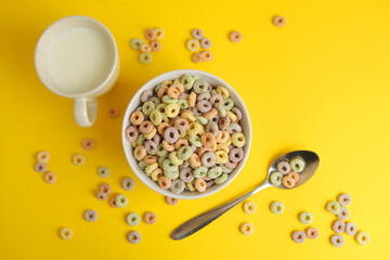 corn breakfast in the form of colorful rings on a colored background.
