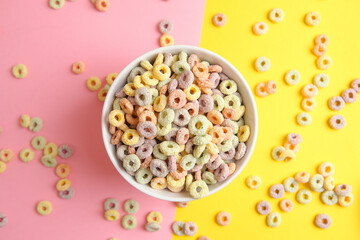 corn breakfast in the form of colorful rings on a colored background.
