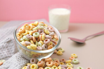 corn breakfast in the form of colorful rings on a colored background.
