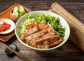 Pork Chops with Vietnamese Rice Noodles served in bowl isolated on table top view of taiwan food