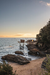 Cabane de pêche bord de plage, coucher de soleil, Pornic France