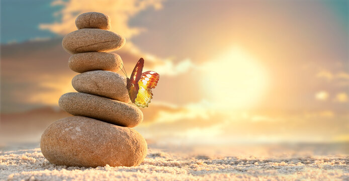 Stone tower. Natural pebble stone on the beach. Balancing body, mind, soul and spirit. Mental health.