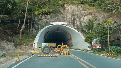 Ternate, Cavite, Philippines - The Kaybiang Tunnel cutting through Mt. Palay Palay, connecting...