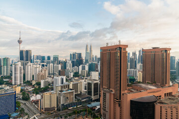 Fototapeta na wymiar Kuala Lumpur skyline with Menara telecommunication tower and Petronas twin towers