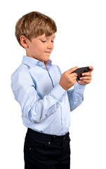 Smiling kid working with phone in hands, isolated over white bac
