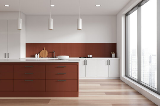 White and brown kitchen interior with island