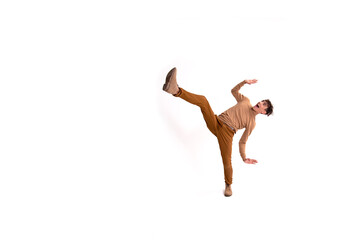 Cheerful attractive young man. The guy dreams of a vacation. White background.