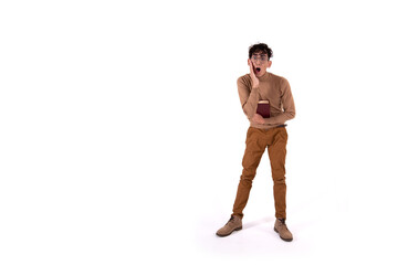 Cheerful attractive student. Guy with textbooks on a white background.