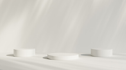 Abstract white room with realistic white cylinder pedestal podium set and leaf shadow overlay....