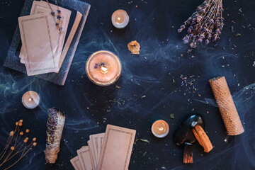 Obraz na płótnie Canvas Tarot, astrology,Esoteric, Occult mystical ritual scene of sorcery tarot candles,dried flowers, palo santo tarot cards, ritual book.Witchcraft,mysticism and occultism,esoteric background,tarot banner