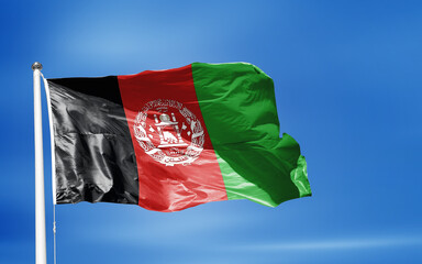 Naklejka na ściany i meble Flag Afghanistan AF waving asian islamic against blue sky outdoor background 