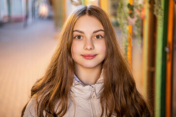 young teenage girl portrait in the street. teenage girl portrait outdoor.