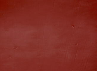 Red abstract background..Beautiful red textured plaster on the wall..Background from blue stucco..