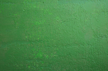 Green abstract background..Beautiful green textured stucco on the wall..Background from green stucco.