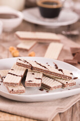 Neapolitan wafers filling with hazelnut-chocolate cream.