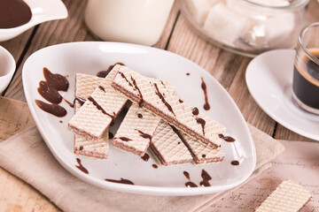 Neapolitan wafers filling with hazelnut-chocolate cream.