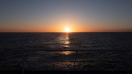 beautiful sunset at sea water. photo of amazing sunset at sea. sunset at sea nature.