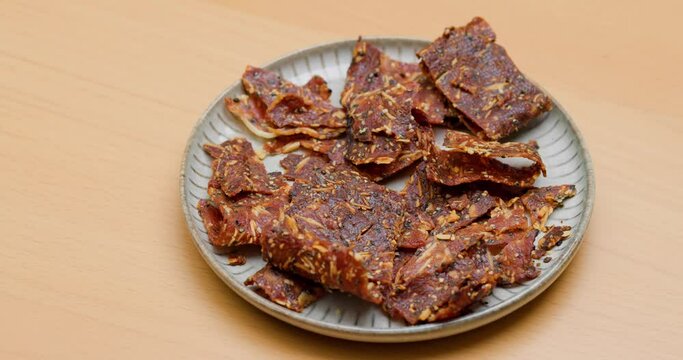 Pile of sliced crispy pork jerky