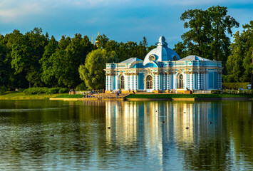 Baroque Hermitage Pavilion in Tsarskoye Selo, Pushkin, St. Petersburg view from the park in autumn with reflection in the water
