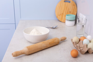 Fototapeta na wymiar Baking cake in modern kitchen - dough recipe ingredients