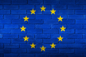 European Union flag painted on a brick wall. - obrazy, fototapety, plakaty