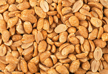 Spicy peanuts pile as background, top view. Chili spicy peanuts.