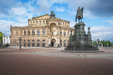 Fototapeta na wymiar Semperoper Opera House and King Johann of Saxony Statue at Theaterplatz - Dresden, Germany