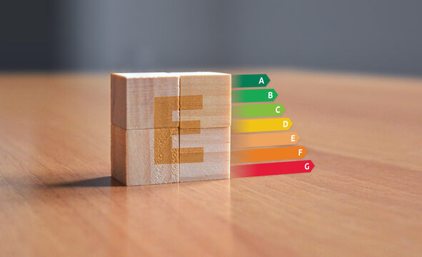 EPC energy performance certificate illustration with wooden blocks displaying a letter symbol with energy ratings from A to F