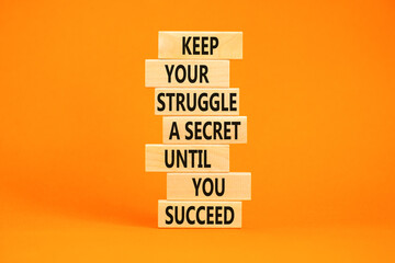 Keep secret symbol. Concept words Keep your struggle a secret until you succeed on wooden blocks. Beautiful orange table orange background. Copy space. Motivational business keep secret concept.