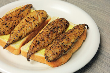 grilled smoked mackerel fillets on toast