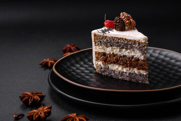 Delicious beautiful piece of cake with cream and berries