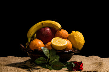fruit still life with black background © fransuarez