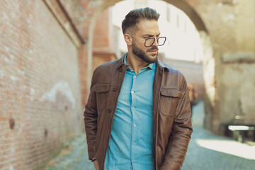 Fototapeta premium casual man posing with tough attitude