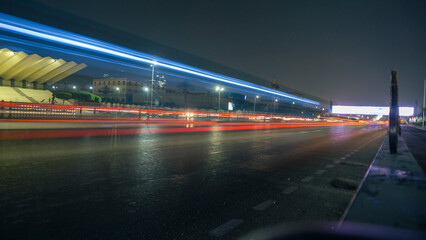 Fototapeta na wymiar Abstract movement blur of car traffic with long exposure on Cairo street