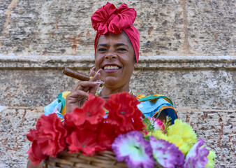 Cuban canastera with habano flowers and typical costume