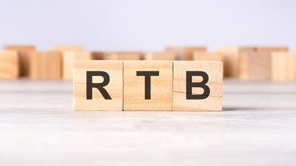 RTB - word concept written on wooden cubes or blocks on a light background