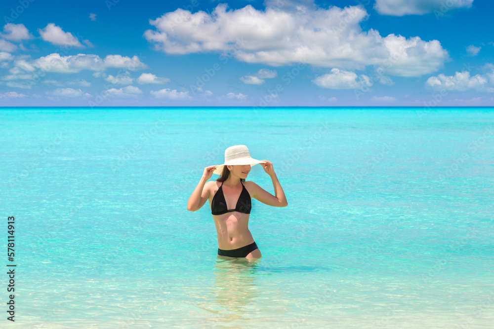 Sticker woman at tropical beach