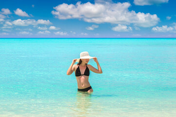 Fototapeta na wymiar Woman at tropical beach