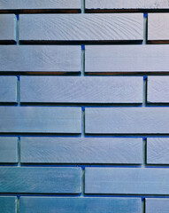 Fondo con detalle y textura de pared de ladrillo ceramico con tonos azules