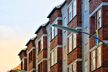 Fototapeta na wymiar Low angle view of brownstone tenement building