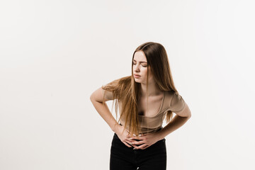 Menstruation and pain during menstruation of girl. Violation of menstrual cycle in young woman. Algo dysmenorrhea.