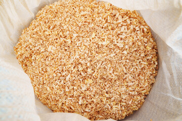 sawdust and shavings in bag. material for agriculture. mulch 