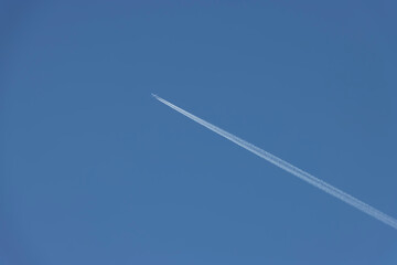 airplane in the blue sky