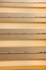 Close-up view of four levels of concrete built sloped walkway railing